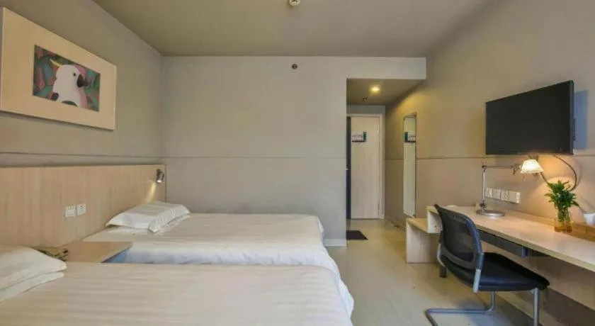 Bed in Jinjiang Inn Taizhou Huangyan Jiufeng Park