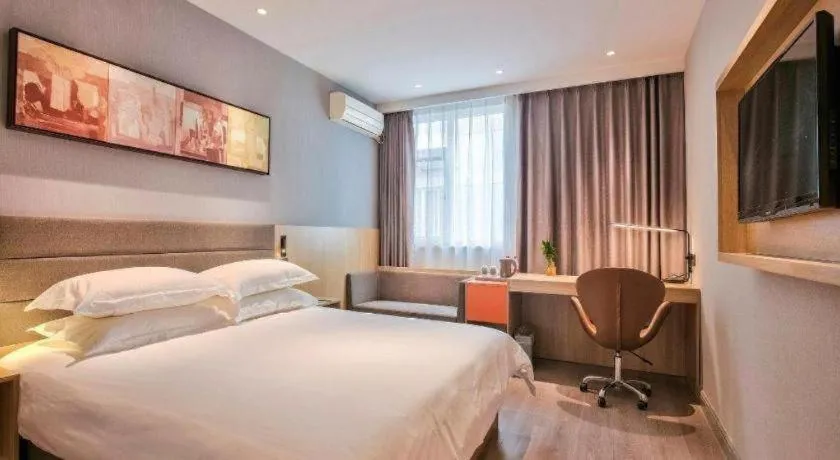 Bed in Jinjiang Inn Taizhou Huangyan Jiufeng Park