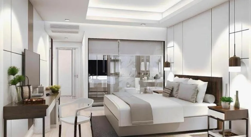 Bed in Thaisun Bangkok Hotel