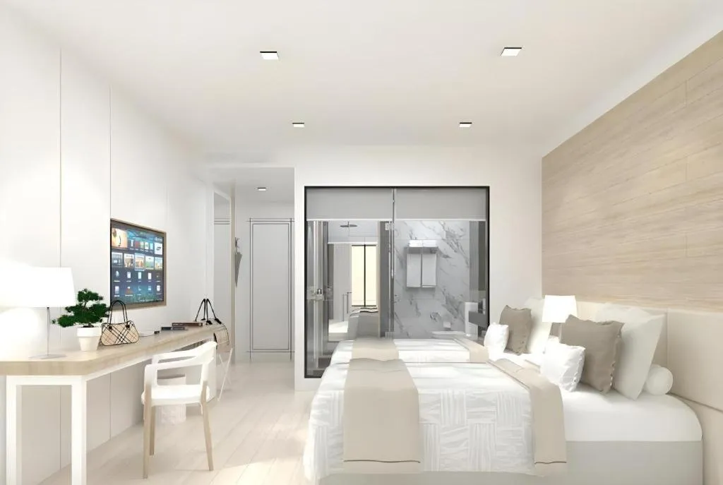 Bed in Thaisun Bangkok Hotel