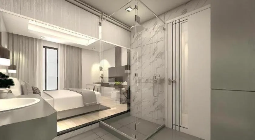 Bed in Thaisun Bangkok Hotel