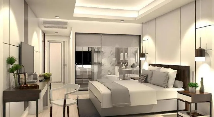 Bed in Thaisun Bangkok Hotel