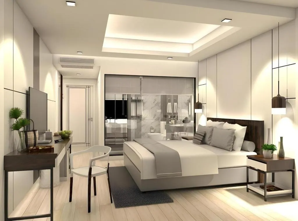 Bed in Thaisun Bangkok Hotel