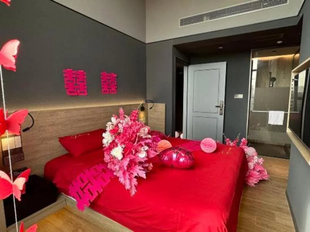 Bed in Opus Hotel Jiangmen