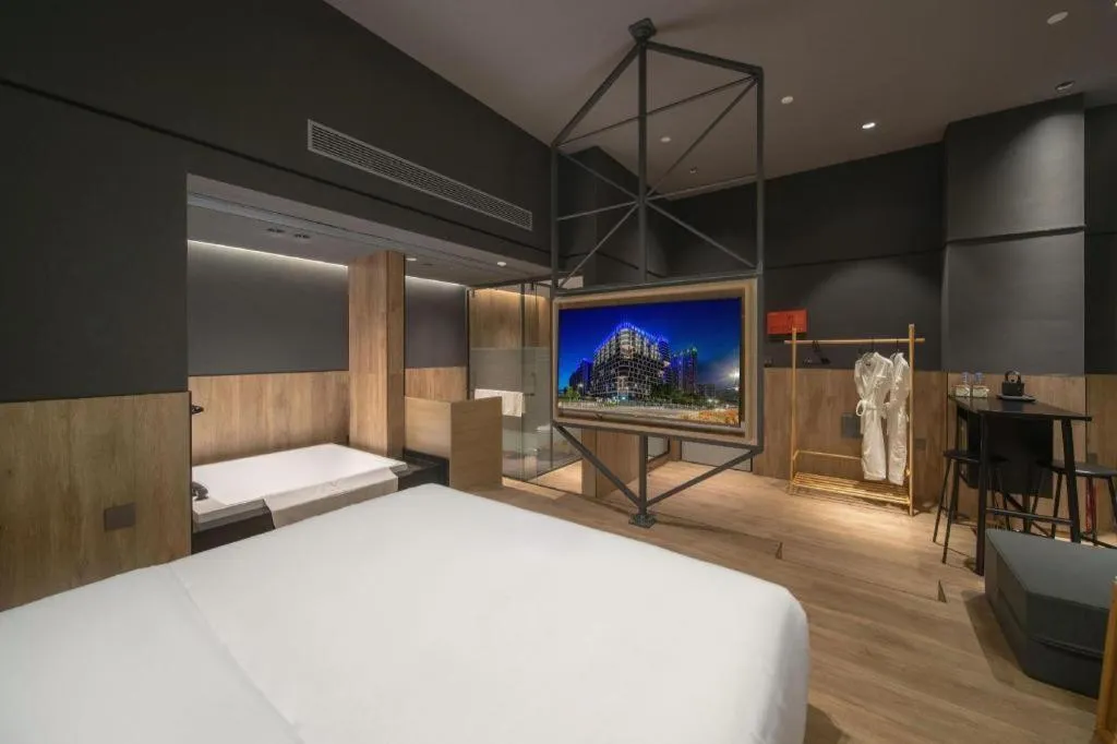 Bed in Opus Hotel Jiangmen