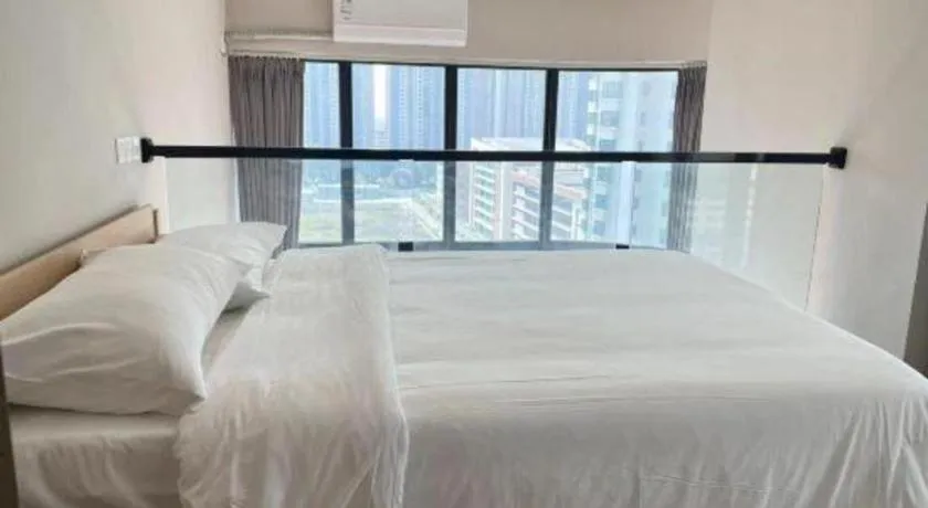 Bed in Opus Hotel Jiangmen