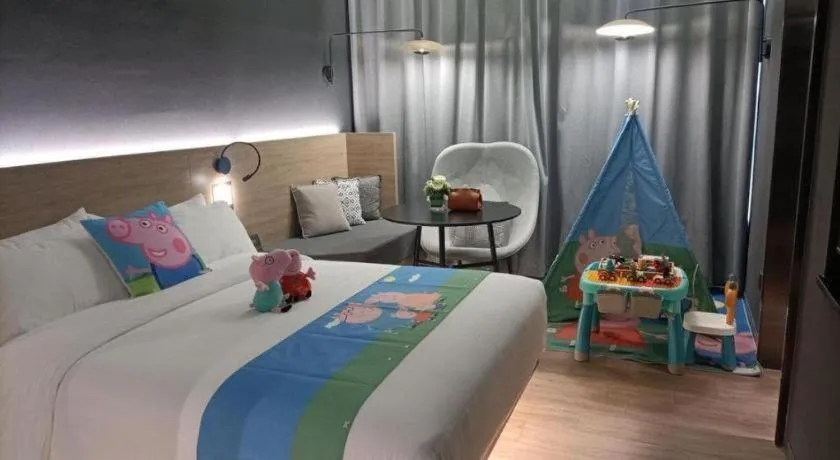 Bed in Opus Hotel Jiangmen