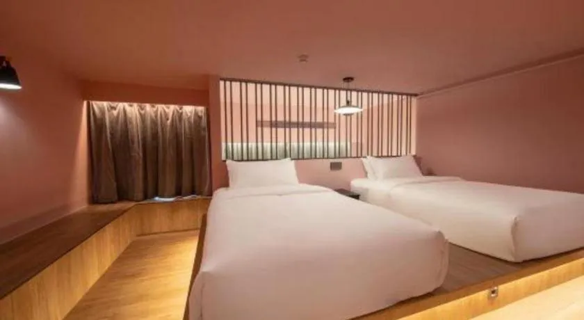 Bed in Opus Hotel Jiangmen