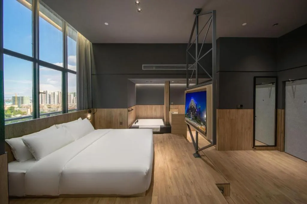 Bed in Opus Hotel Jiangmen