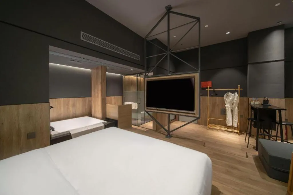 Bed in Opus Hotel Jiangmen