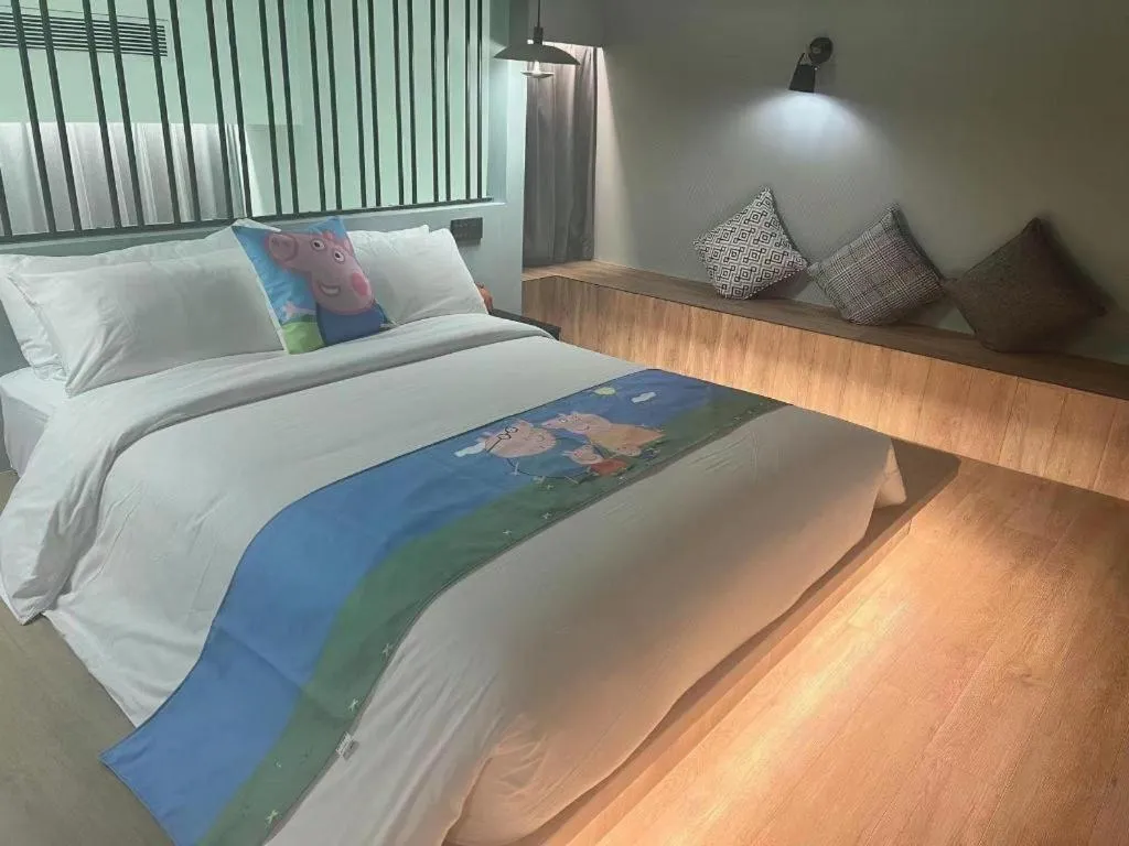 Bed in Opus Hotel Jiangmen