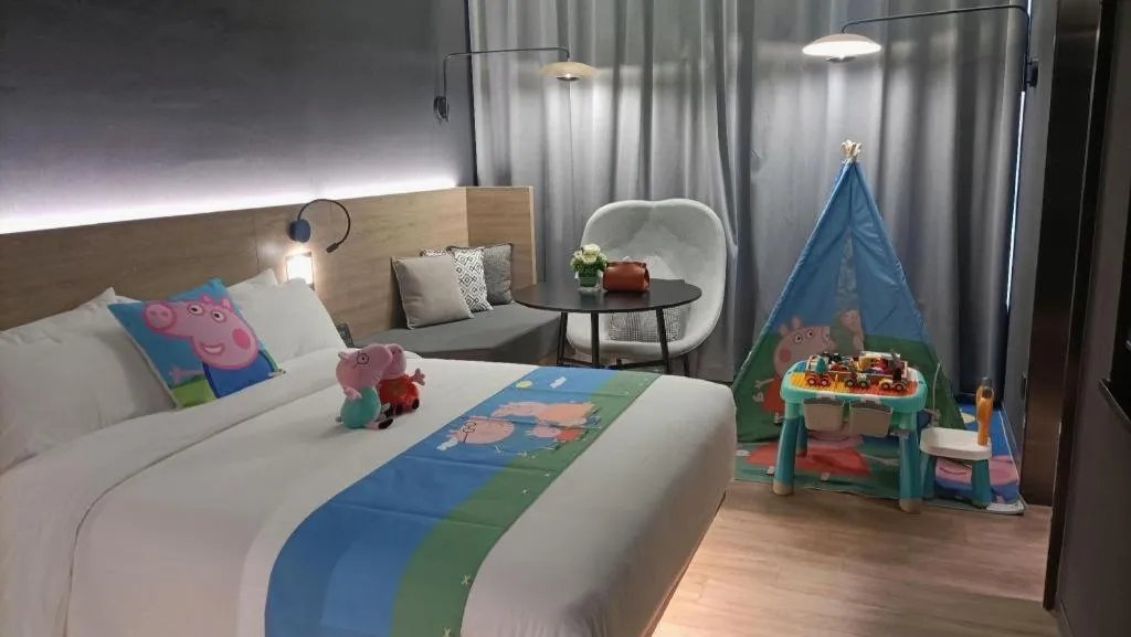 Bed in Opus Hotel Jiangmen