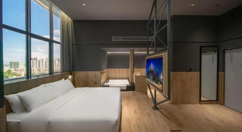 Bed in Opus Hotel Jiangmen