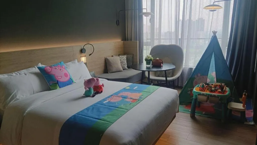 Bed in Opus Hotel Jiangmen