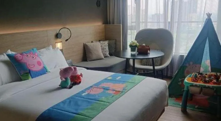 Bed in Opus Hotel Jiangmen