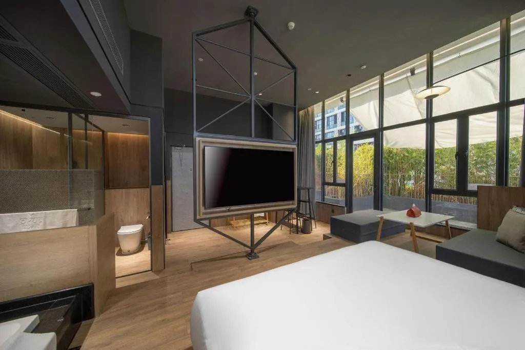 Bed in Opus Hotel Jiangmen