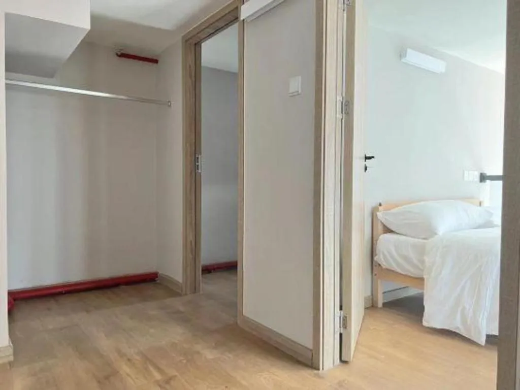 Bed in Opus Hotel Jiangmen