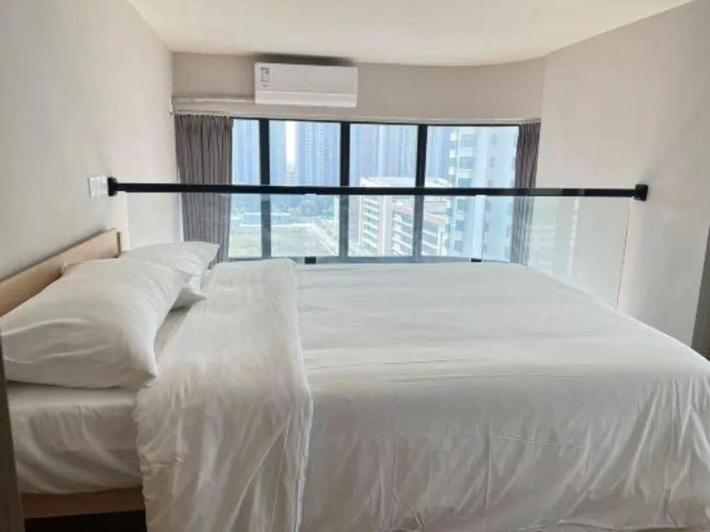 Bed in Opus Hotel Jiangmen