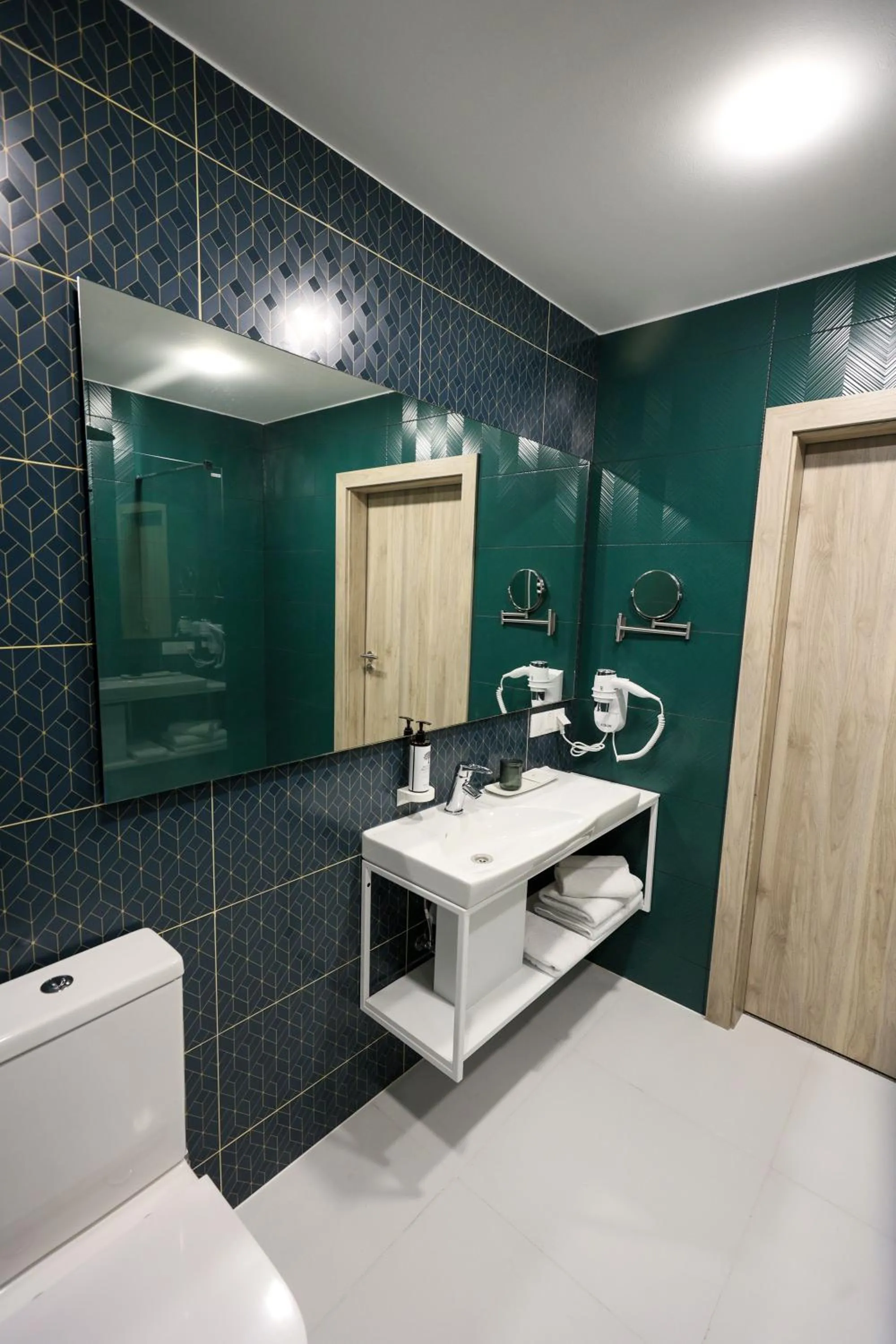 Toilet in Suncity Hotel & SPA