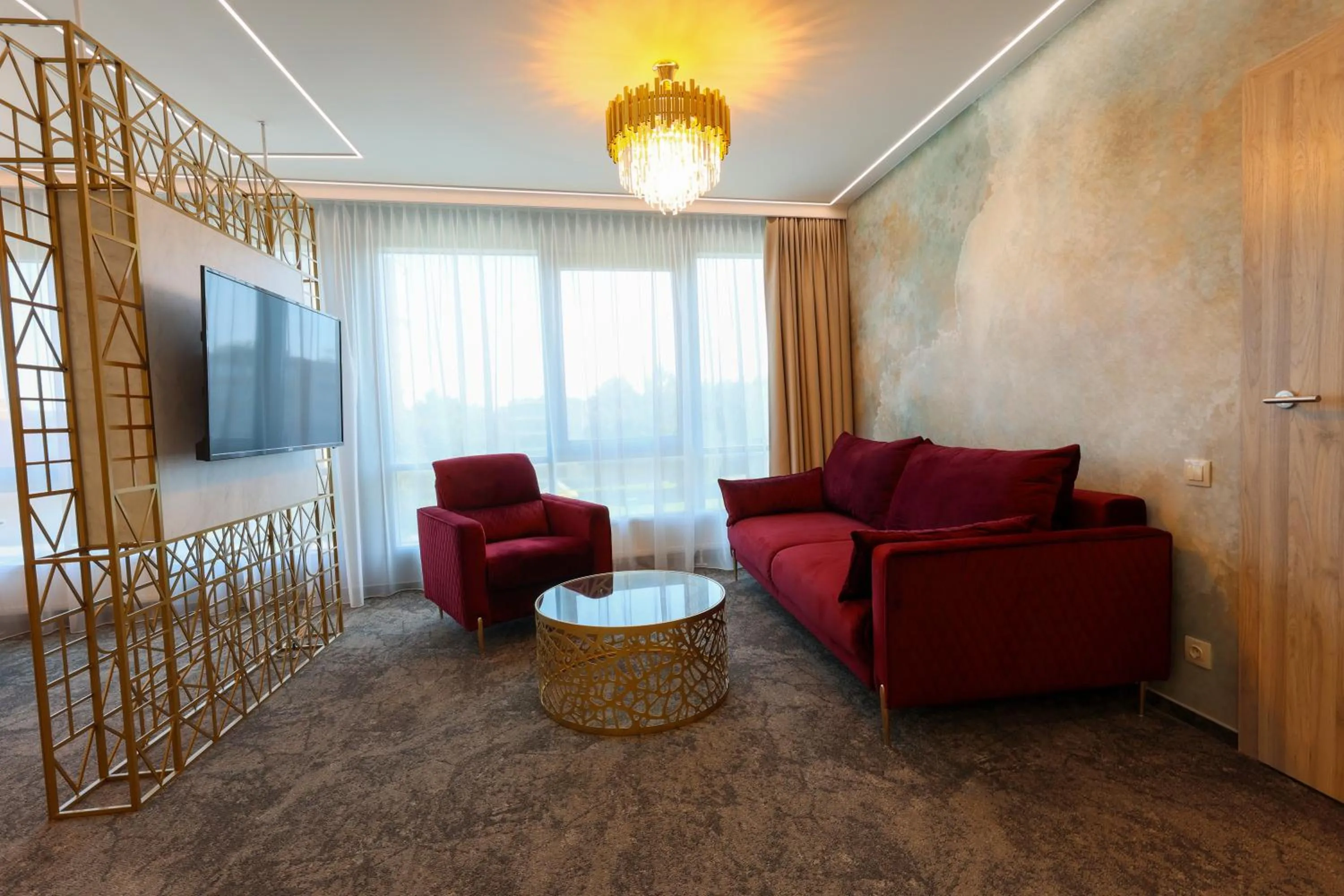 Living room in Suncity Hotel & SPA