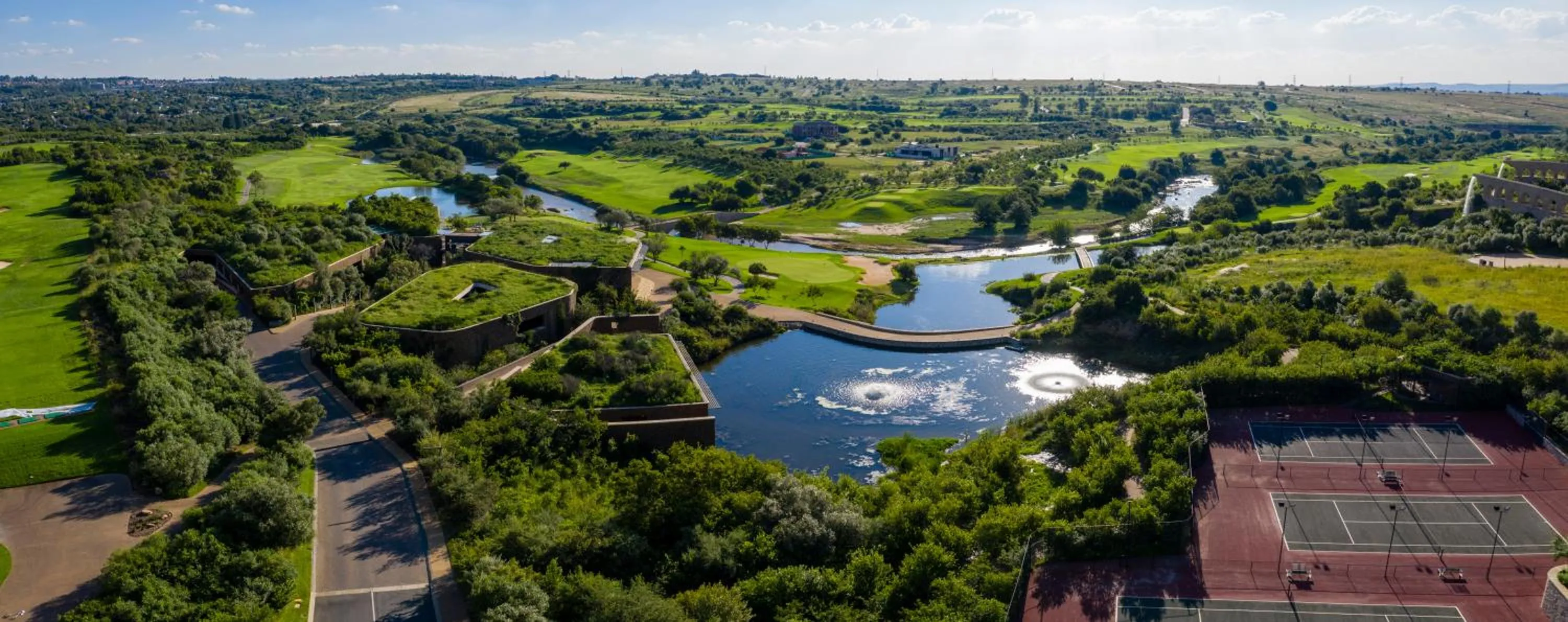 Tennis court in Steyn City Hotel by Saxon