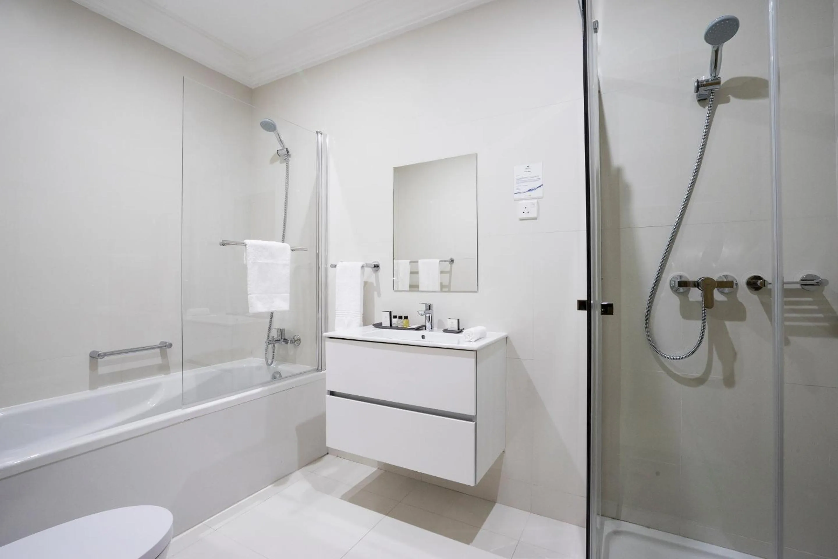 Shower in Fiesta Residences Boutique Hotel and Serviced Apartments.