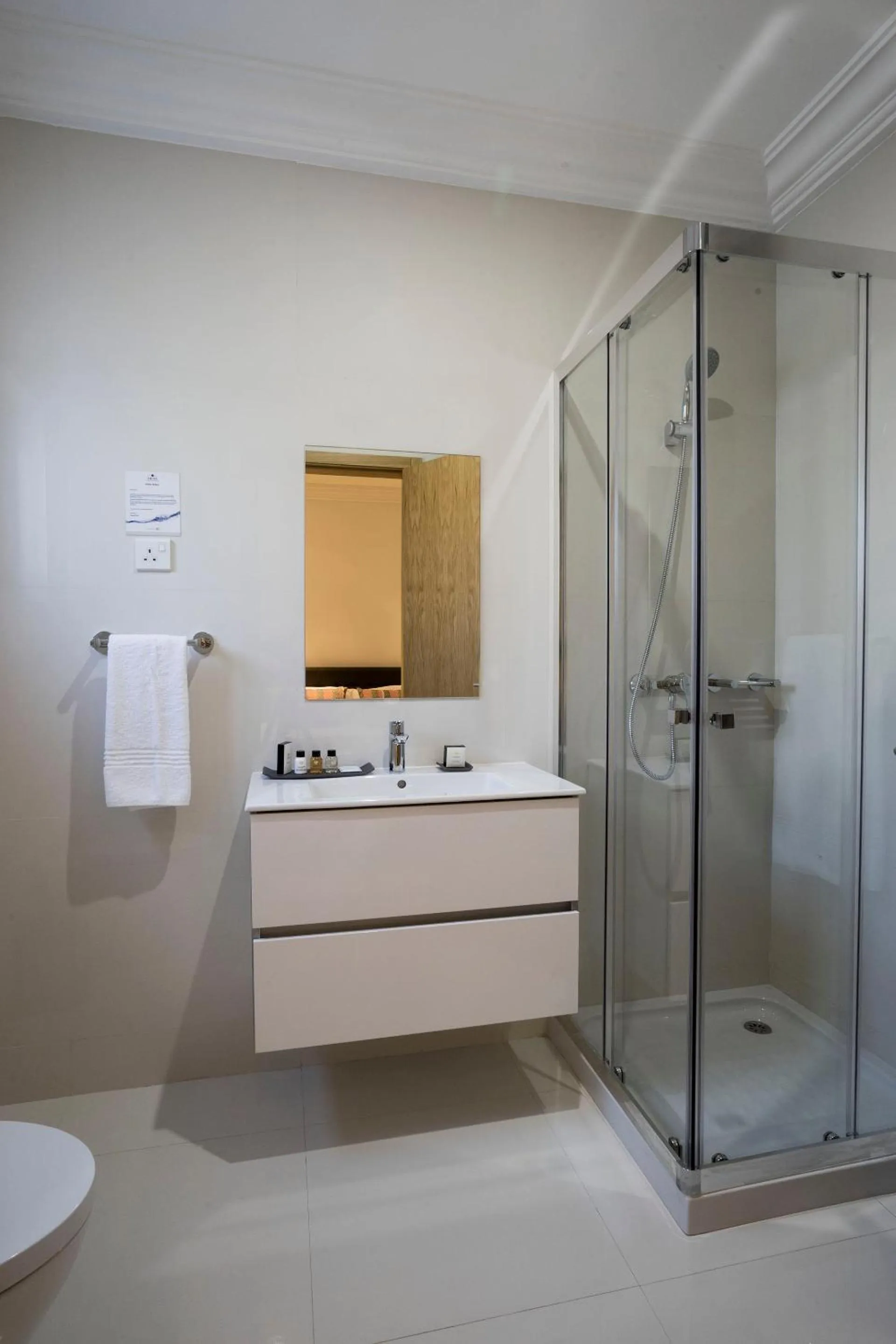 Shower in Fiesta Residences Boutique Hotel and Serviced Apartments.