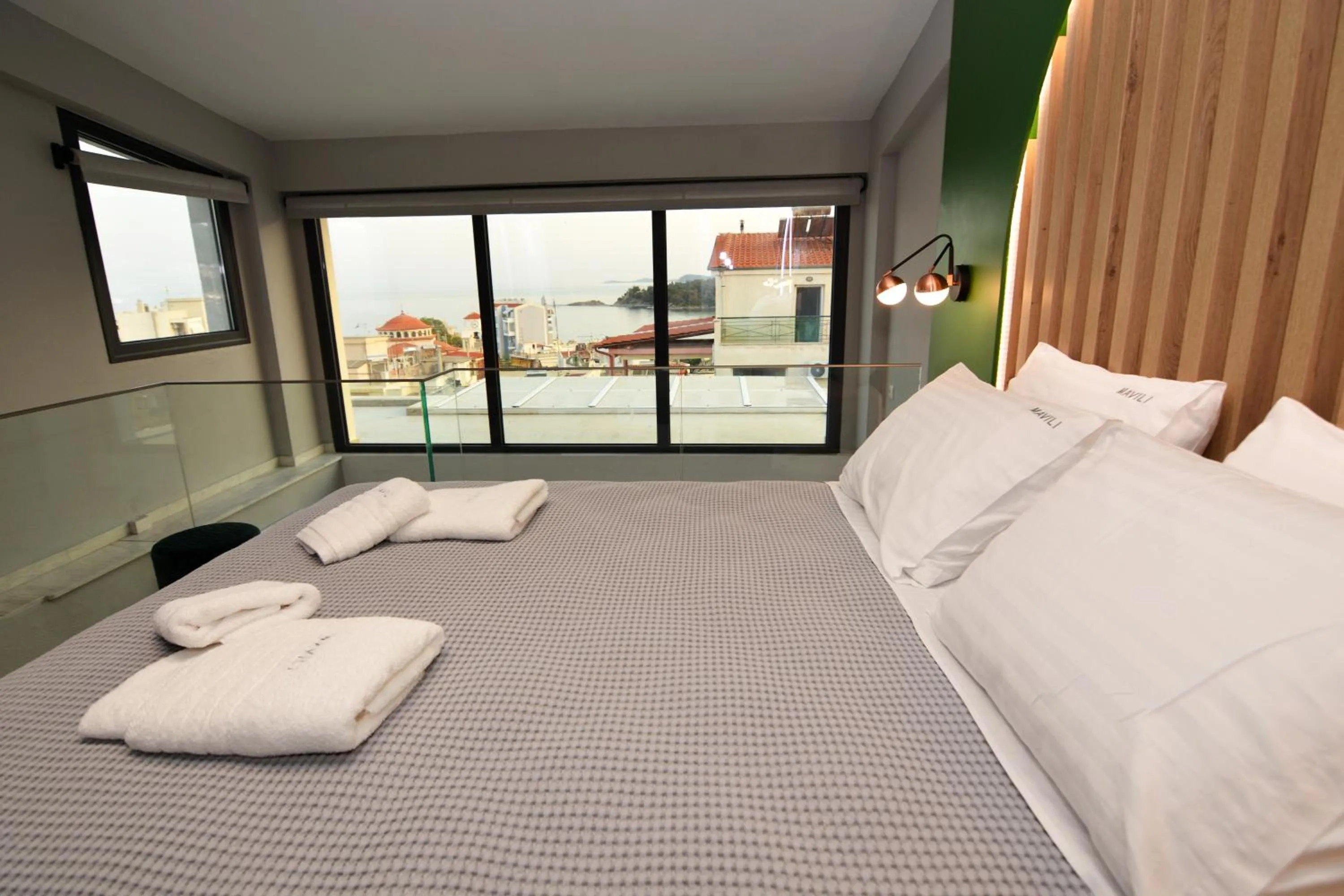 Bed in Mavili Luxury Apartments