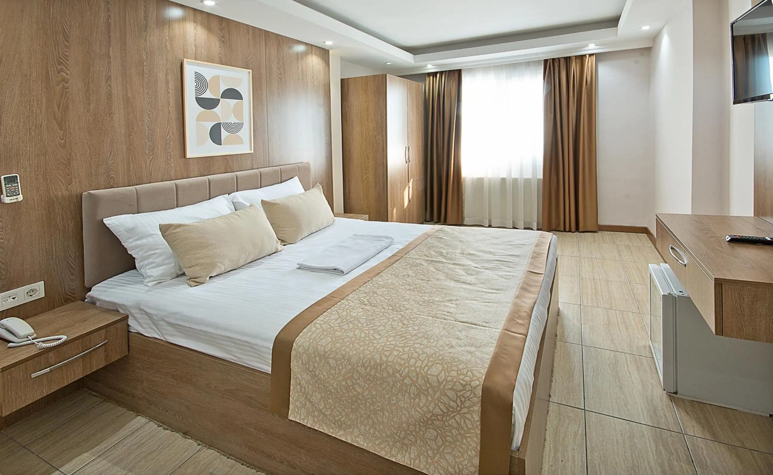 Bed in Lion City Hotel