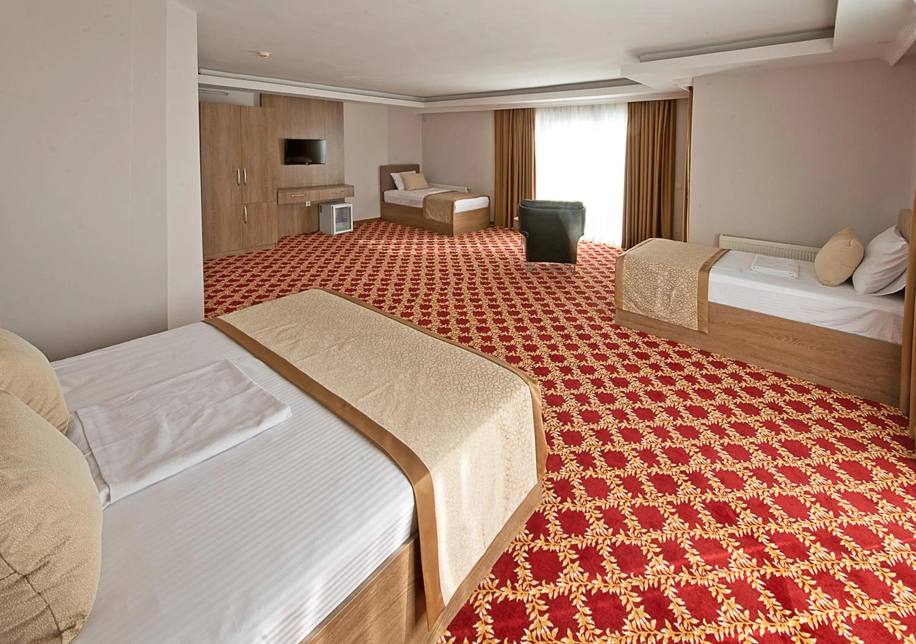 Bed in Lion City Hotel