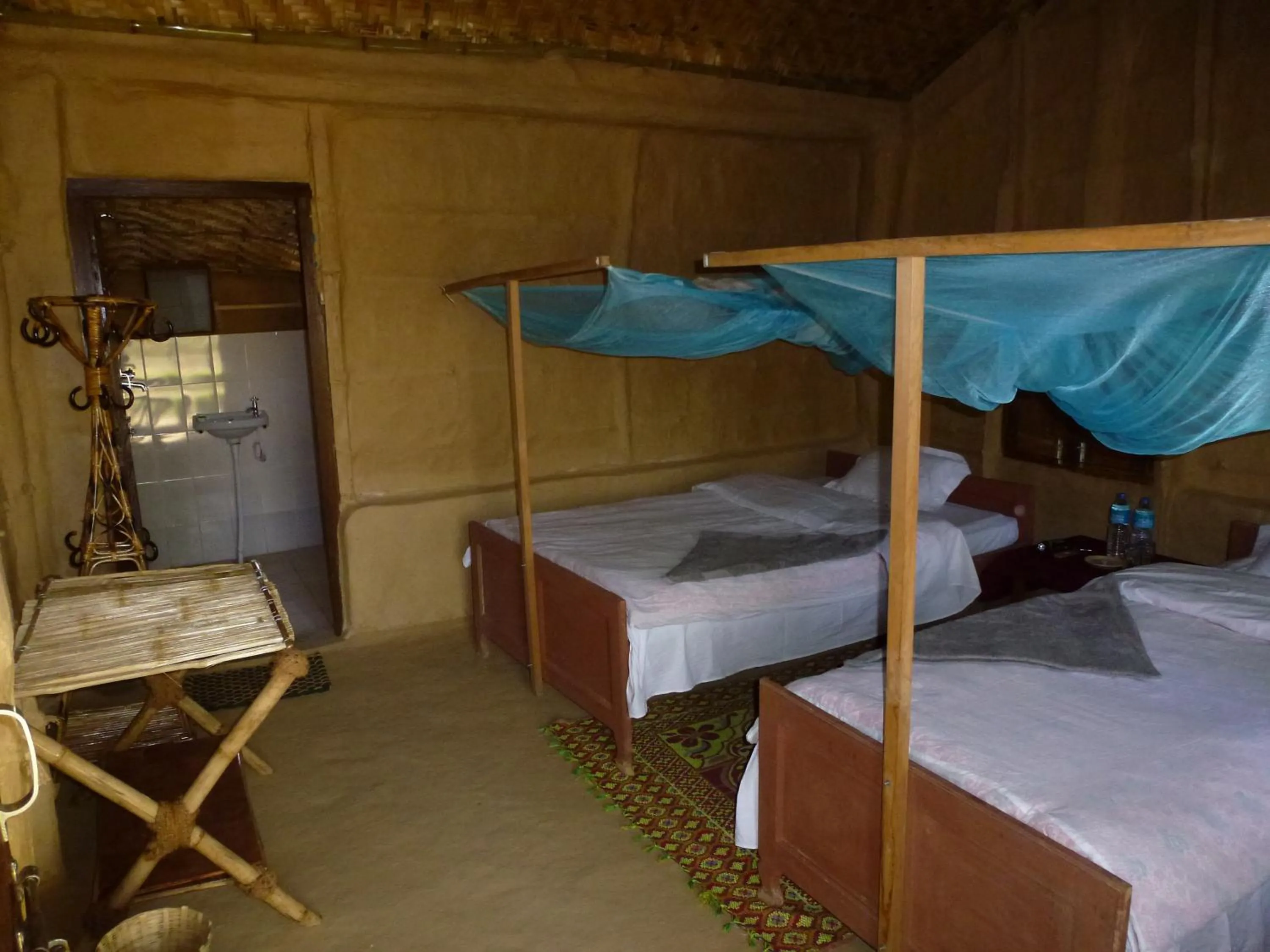 Shower, Bed in Bardia Eco Lodge