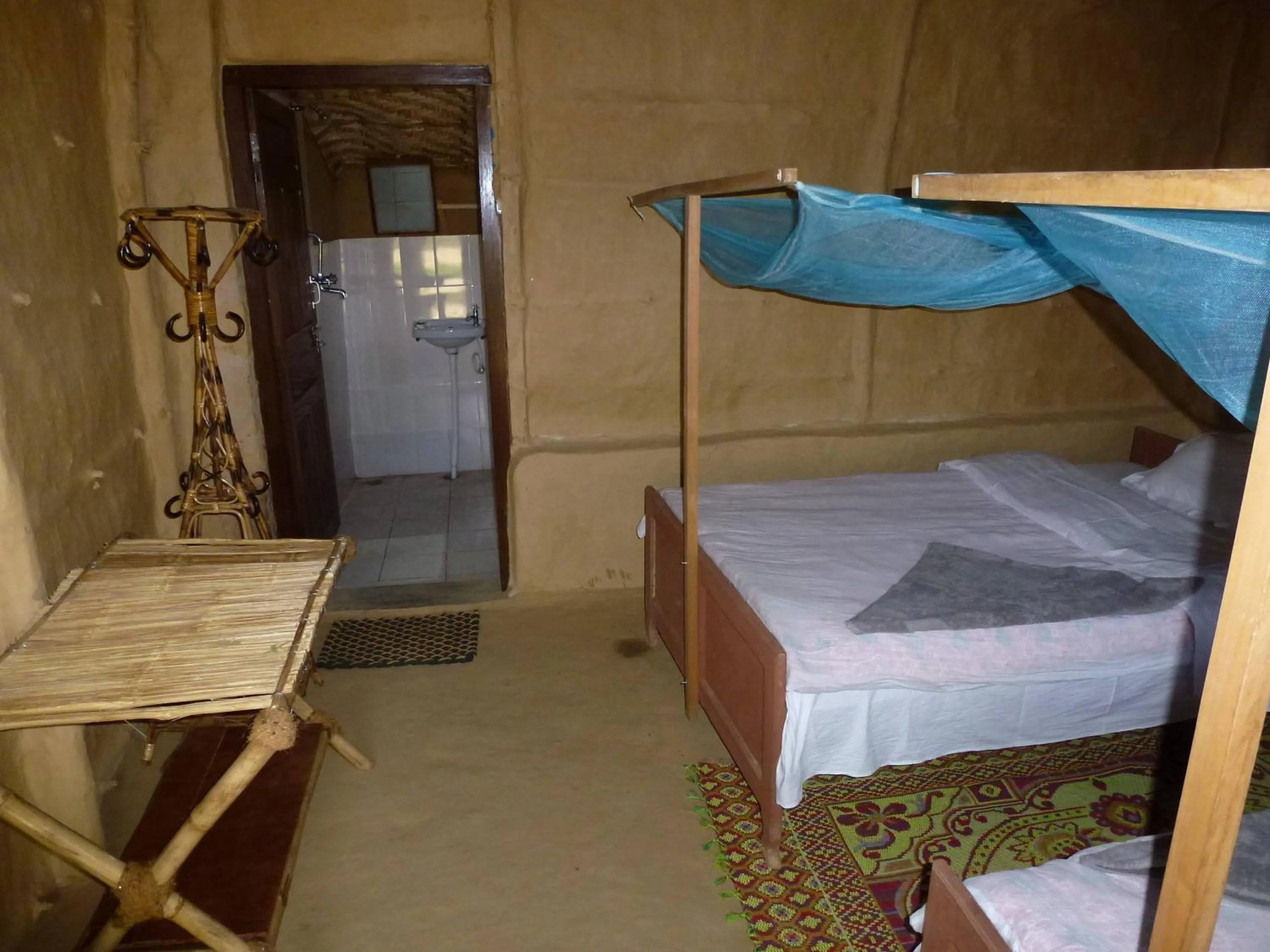 Decorative detail, Bed in Bardia Eco Lodge