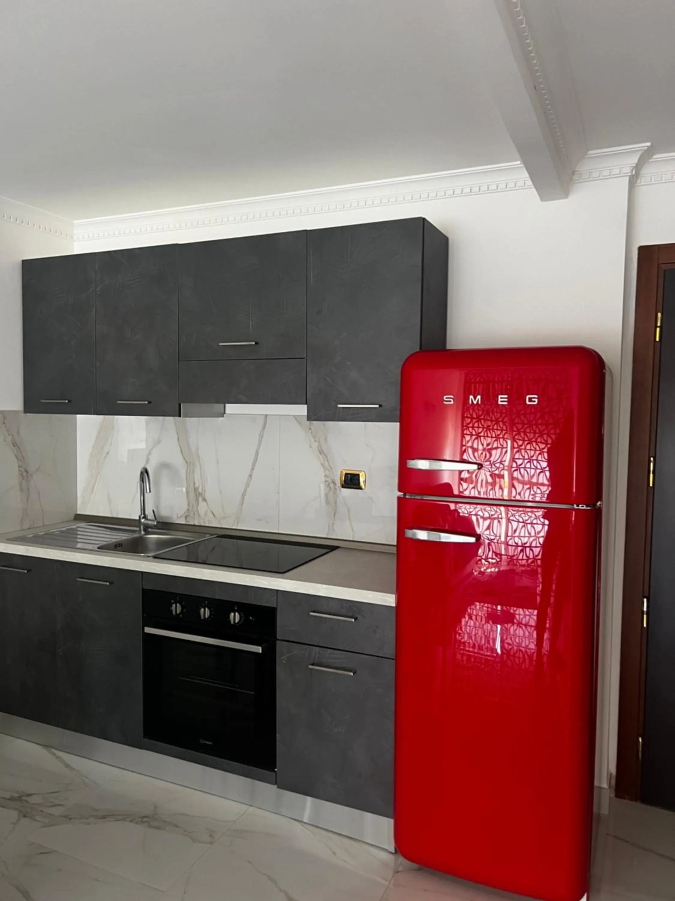 Kitchen or kitchenette in Parco Tirreno Hotel