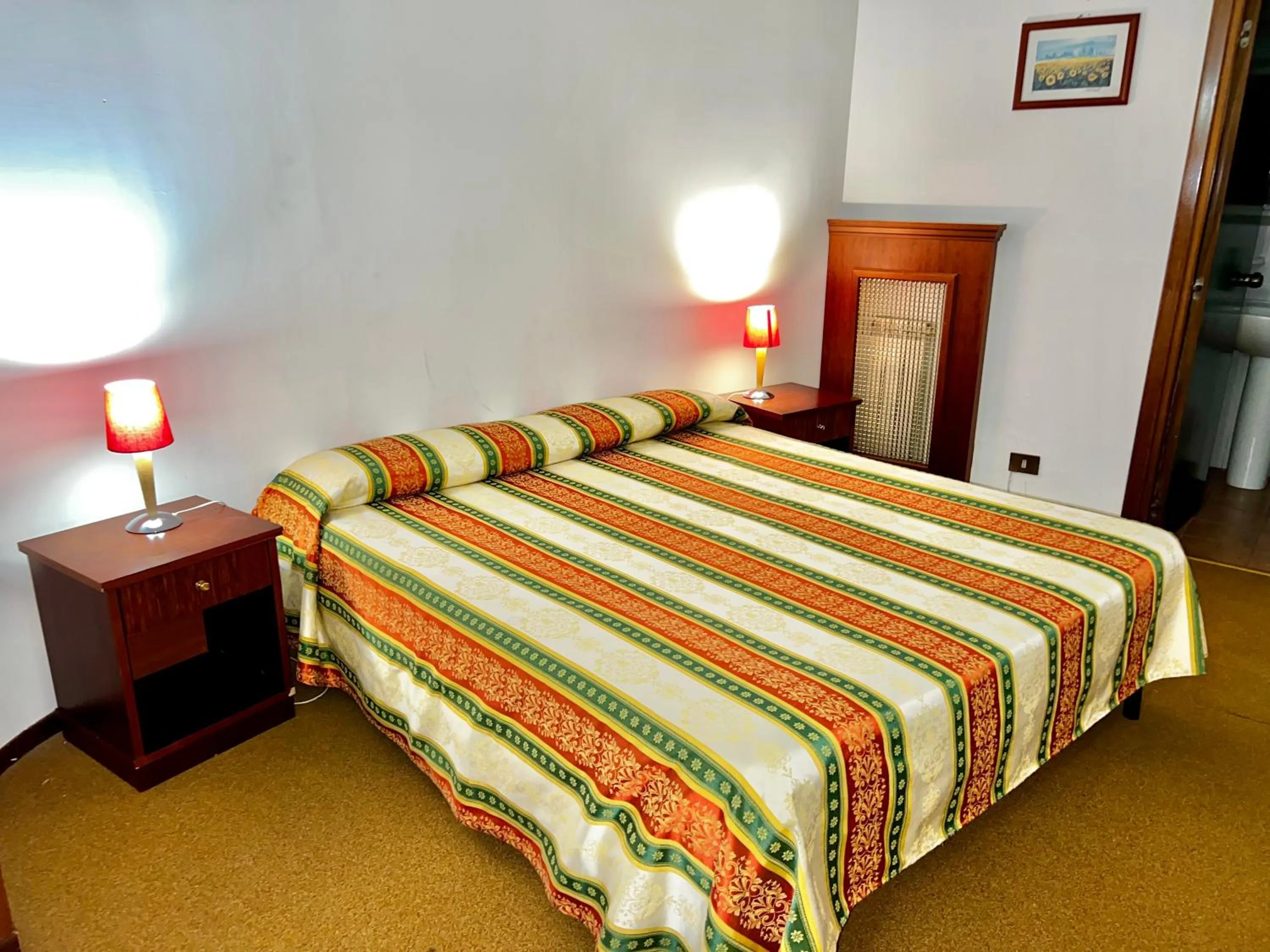Bed in Parco Tirreno Hotel