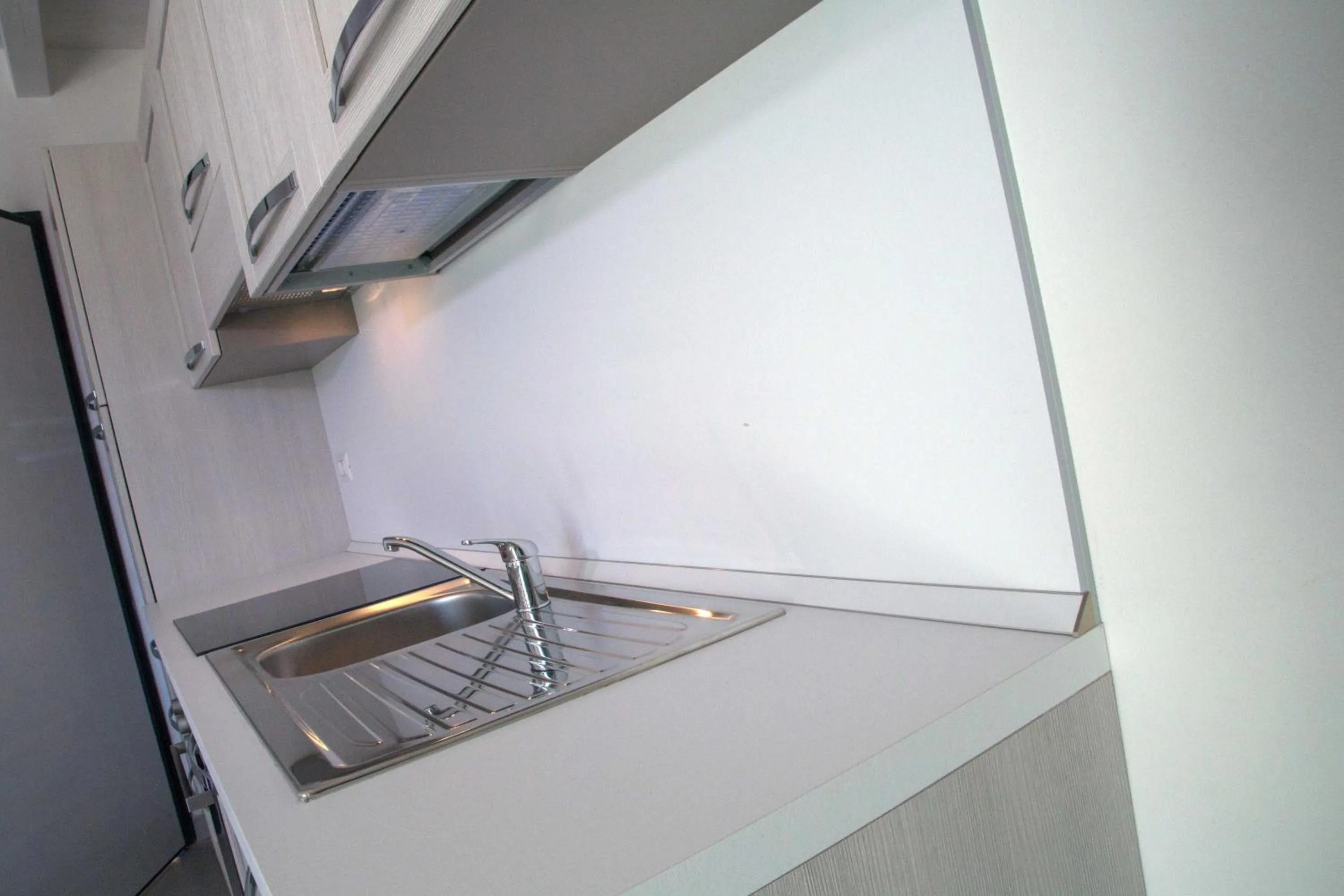 Kitchen or kitchenette in La Residenza del Golfo