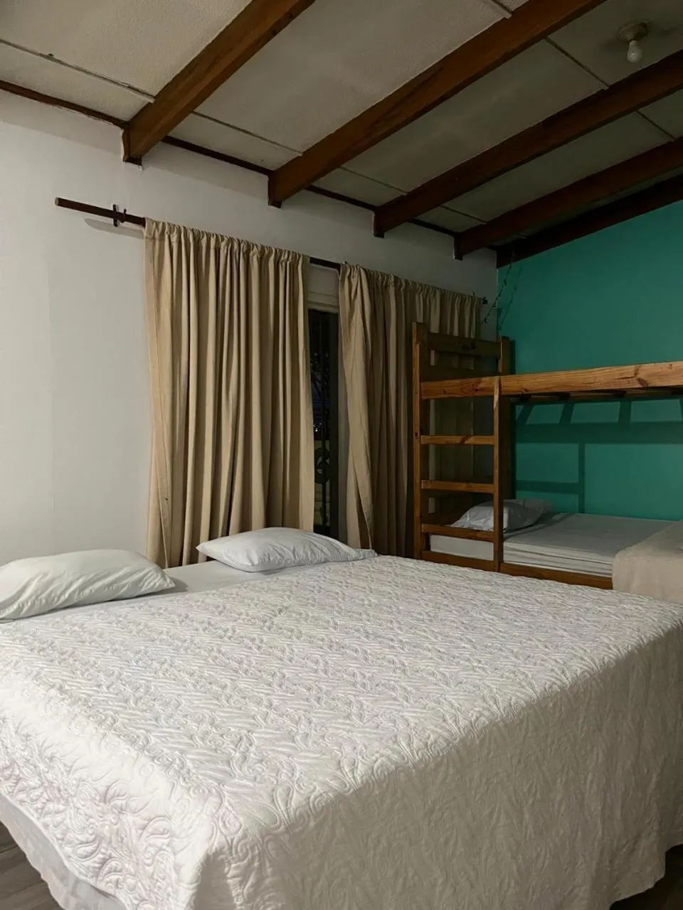 Bed in Gaudy's Hotel