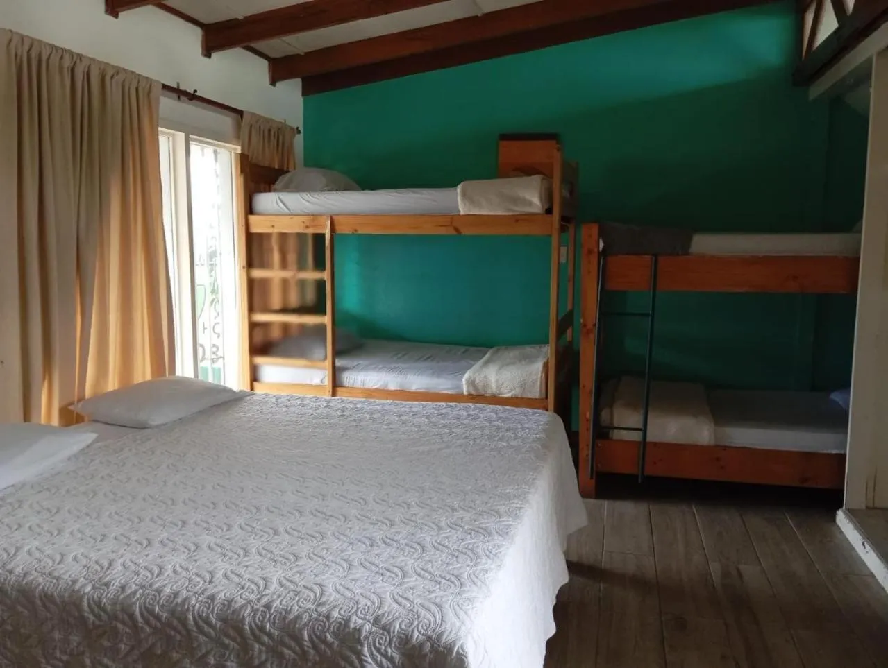 Bed in Gaudy's Hotel