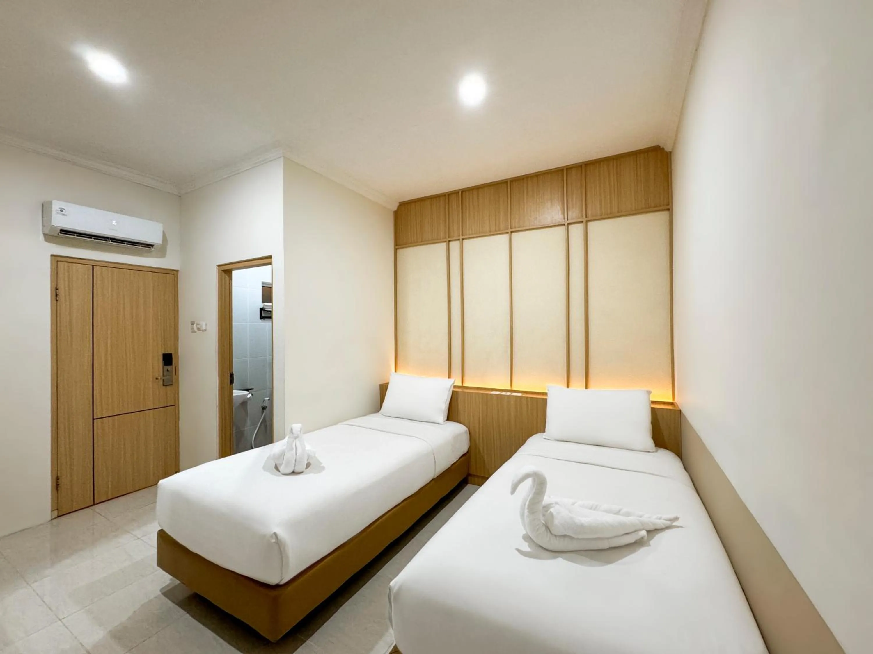 Bed in Masri Living by Daphna Management