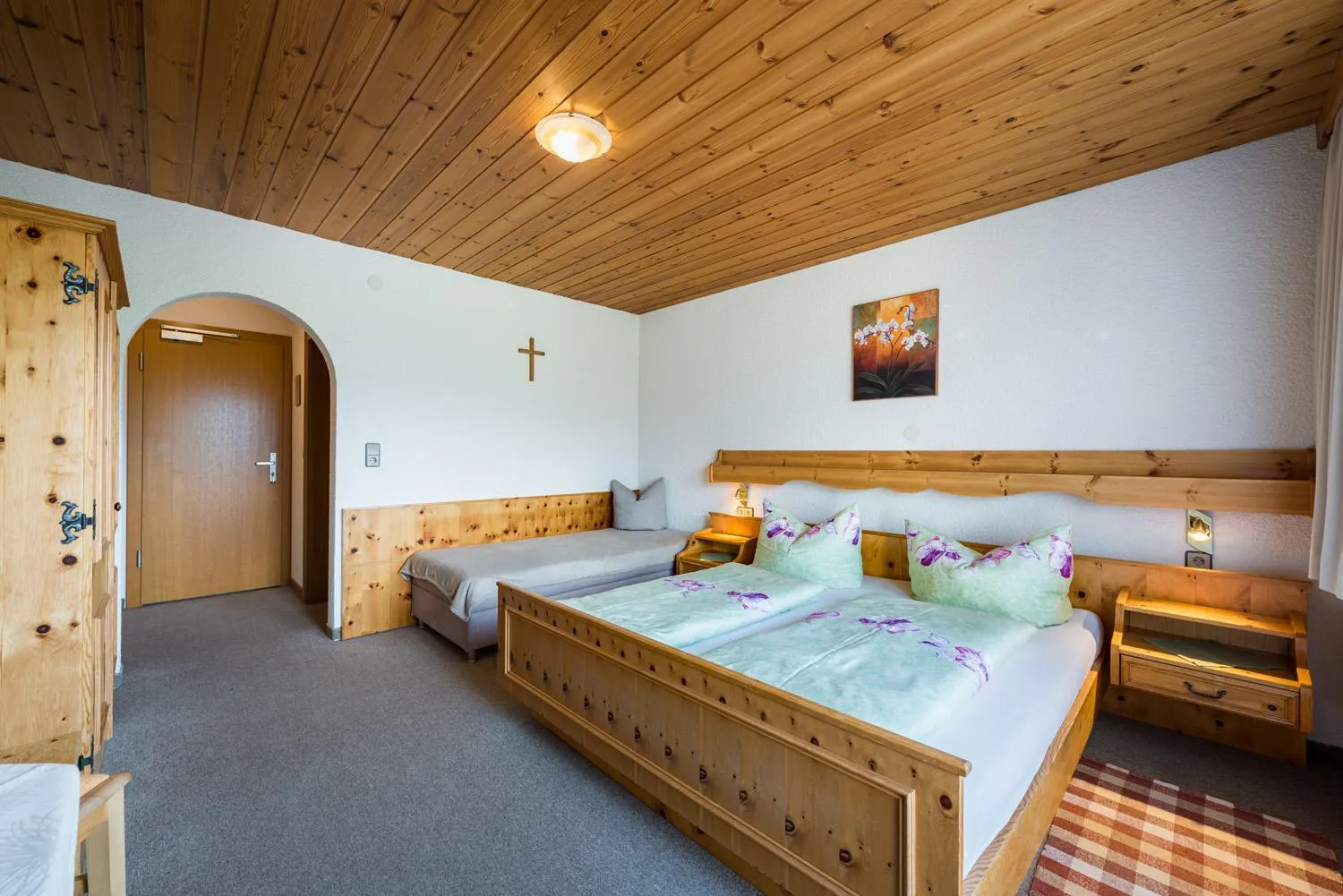 Bed in Ferienpension Steiner