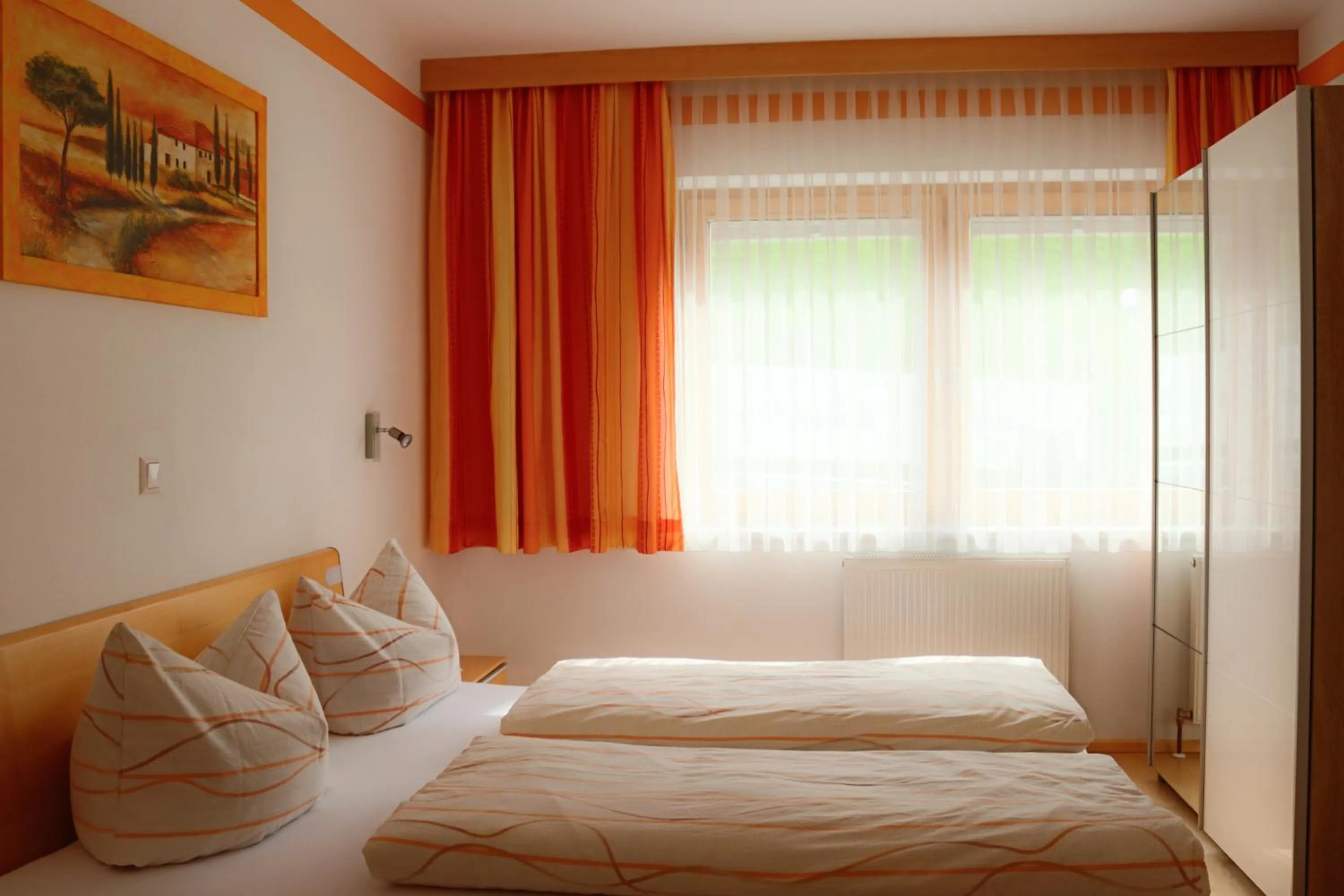 Bed in Ferienpension Steiner