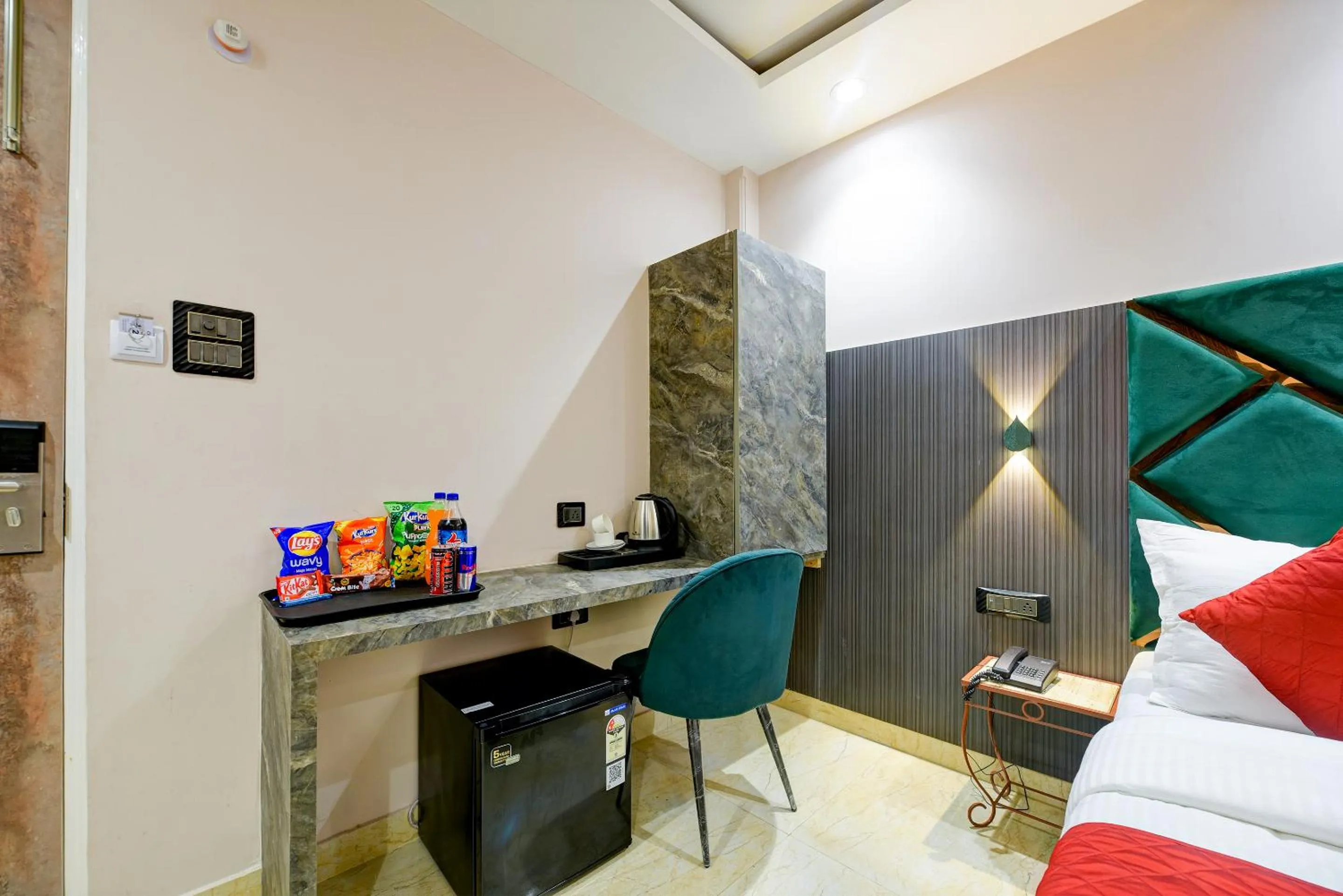 Photo of the whole room in The Pearl Plaza Hotel in City Centre - Near New Delhi Railway Station