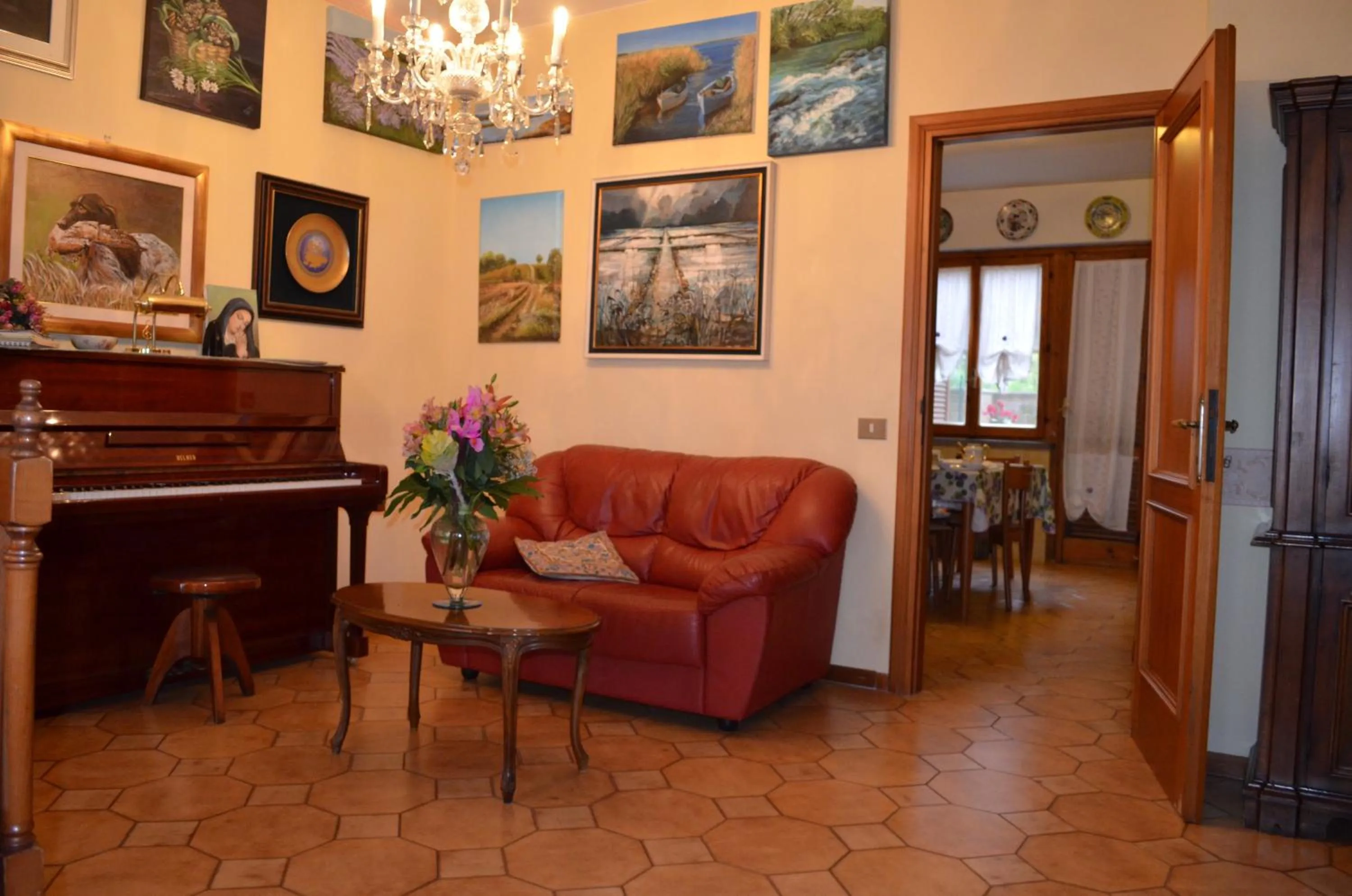 Communal lounge/ TV room in B&B Nonna Luisa