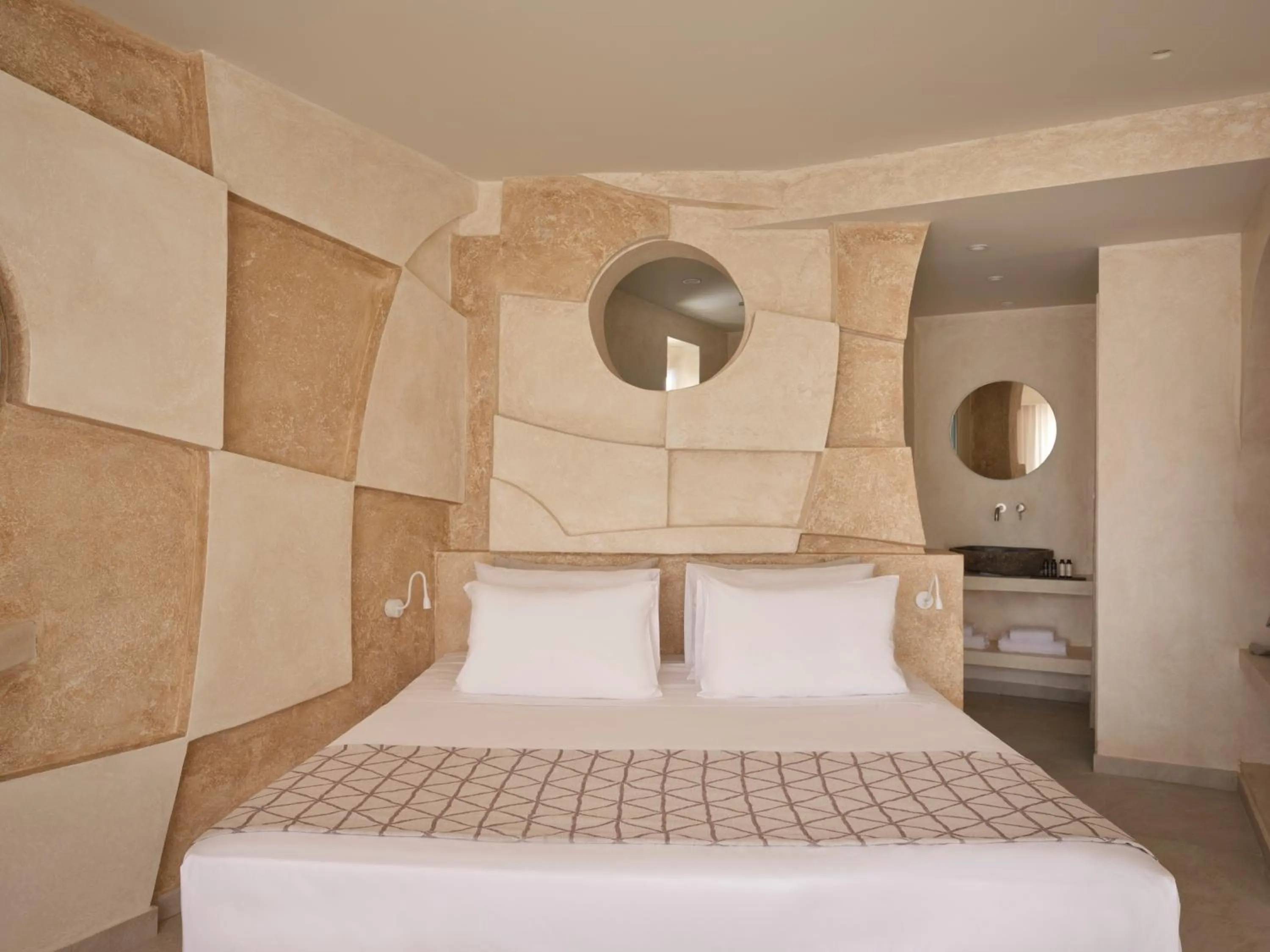 Bed in Heyday Luxury Suites