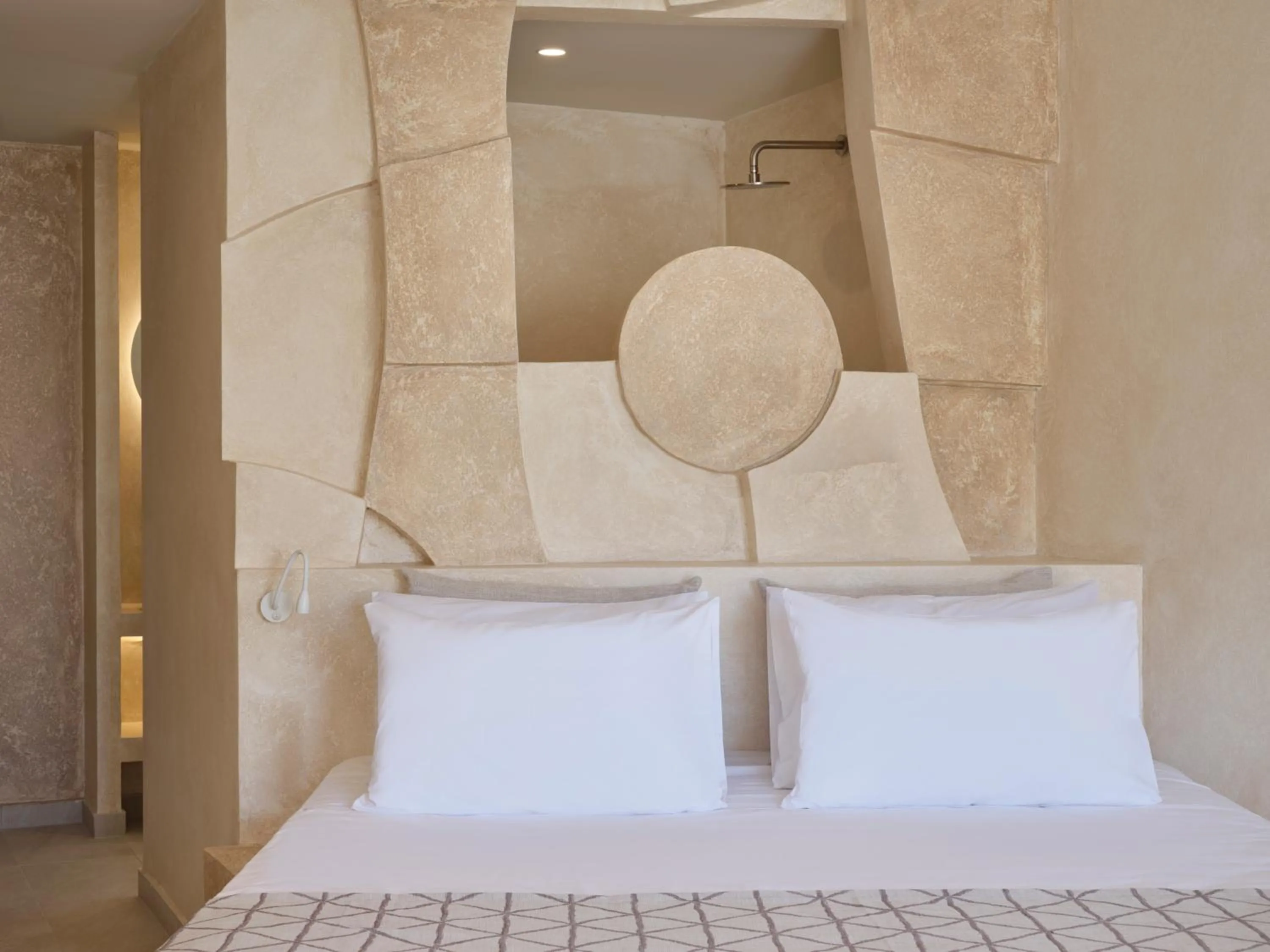 Bed in Heyday Luxury Suites