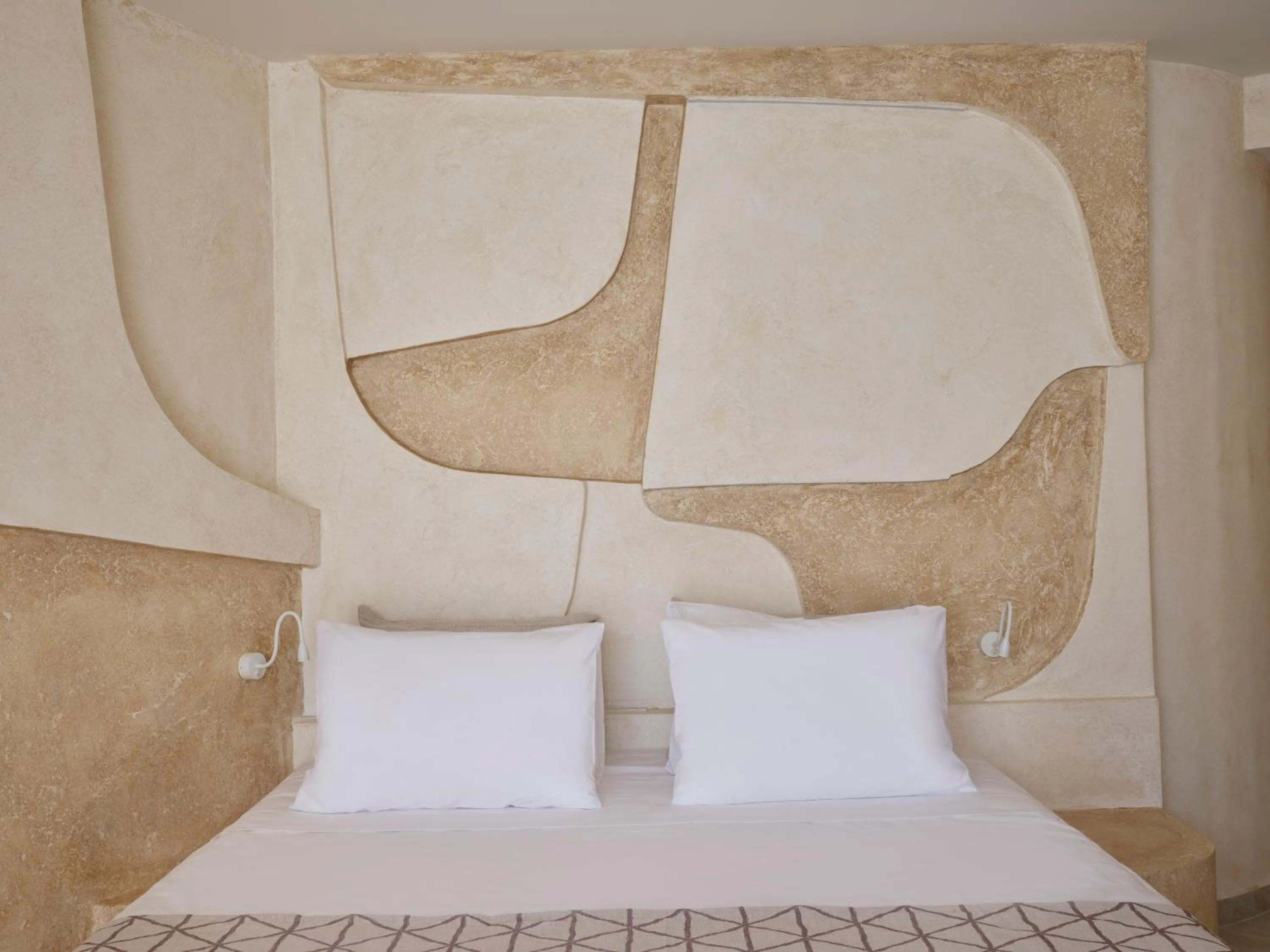 Bed in Heyday Luxury Suites