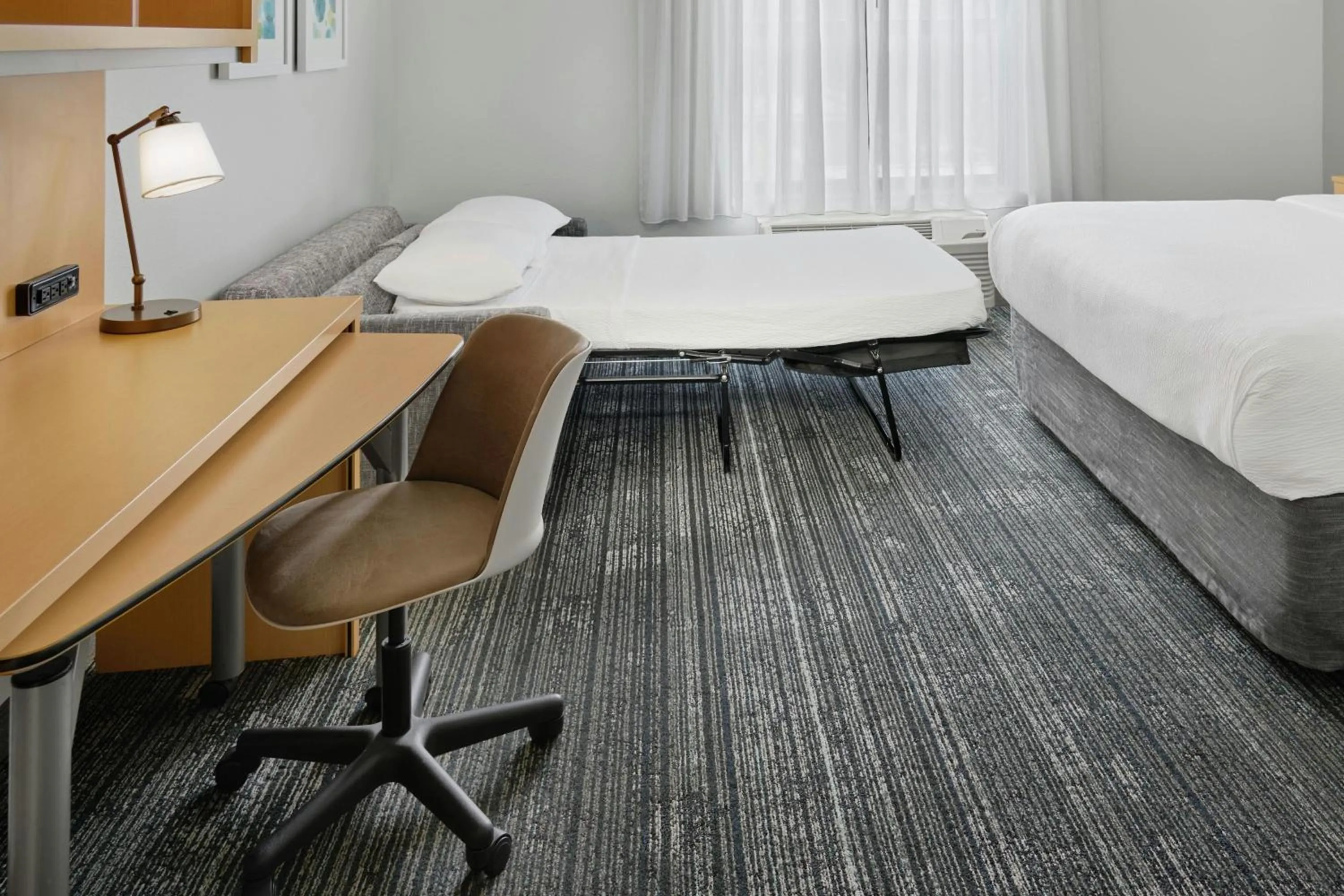 Photo of the whole room, Bed in TownePlace Suites by Marriott Lawrence Downtown