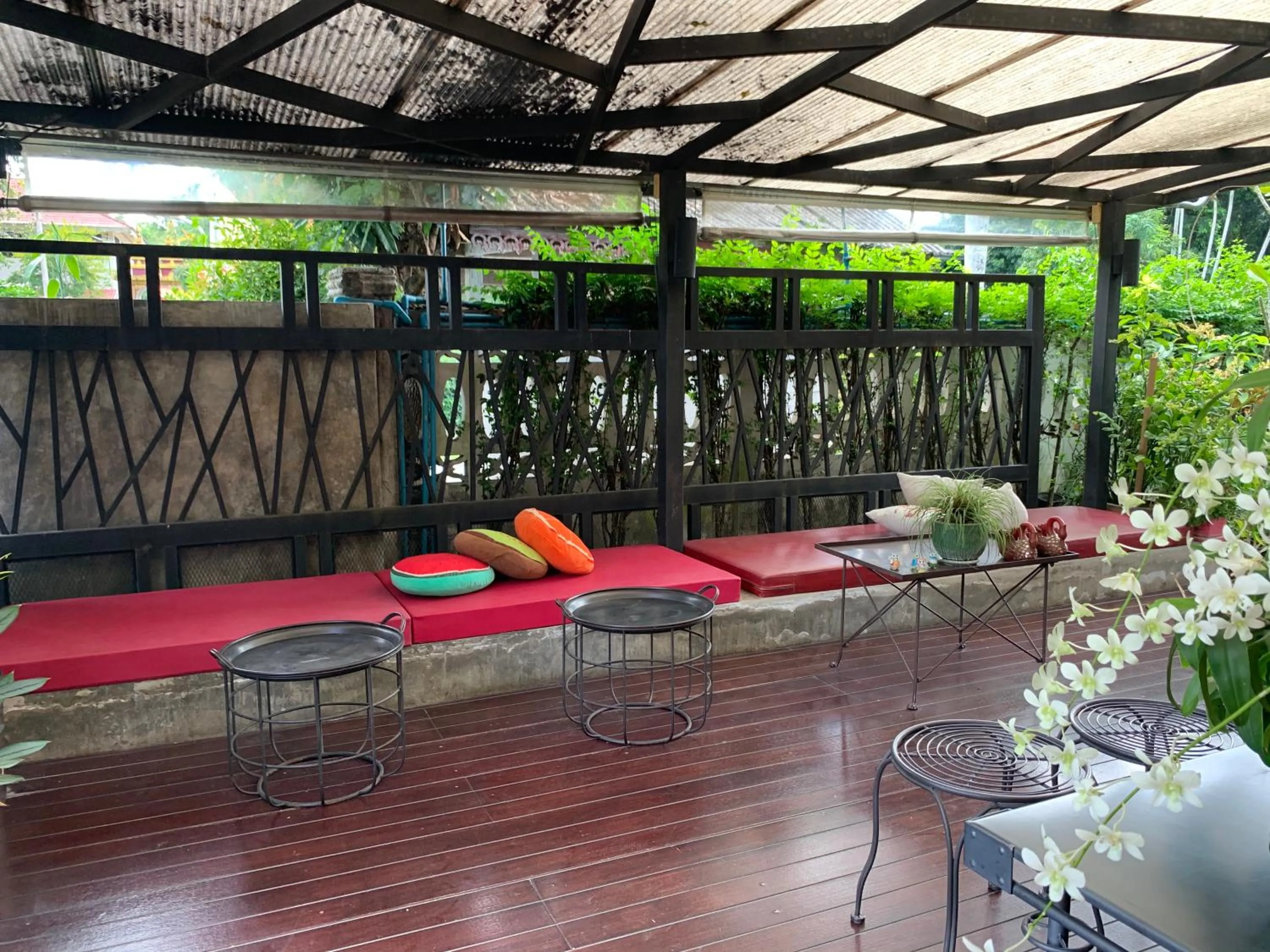 Seating area in Homey Dormy Chiangrai