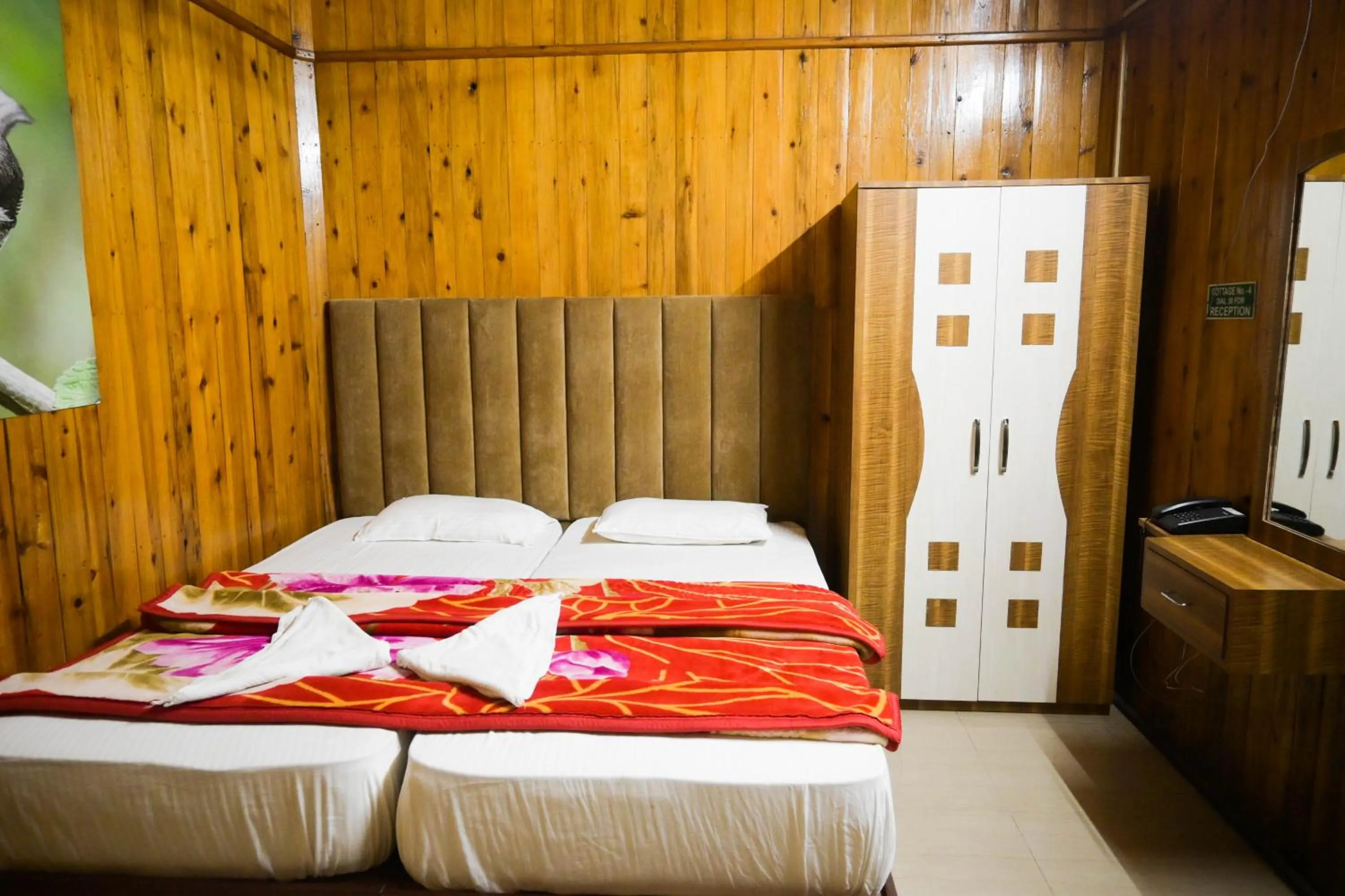 Bed in Aranya Jungle Resorts