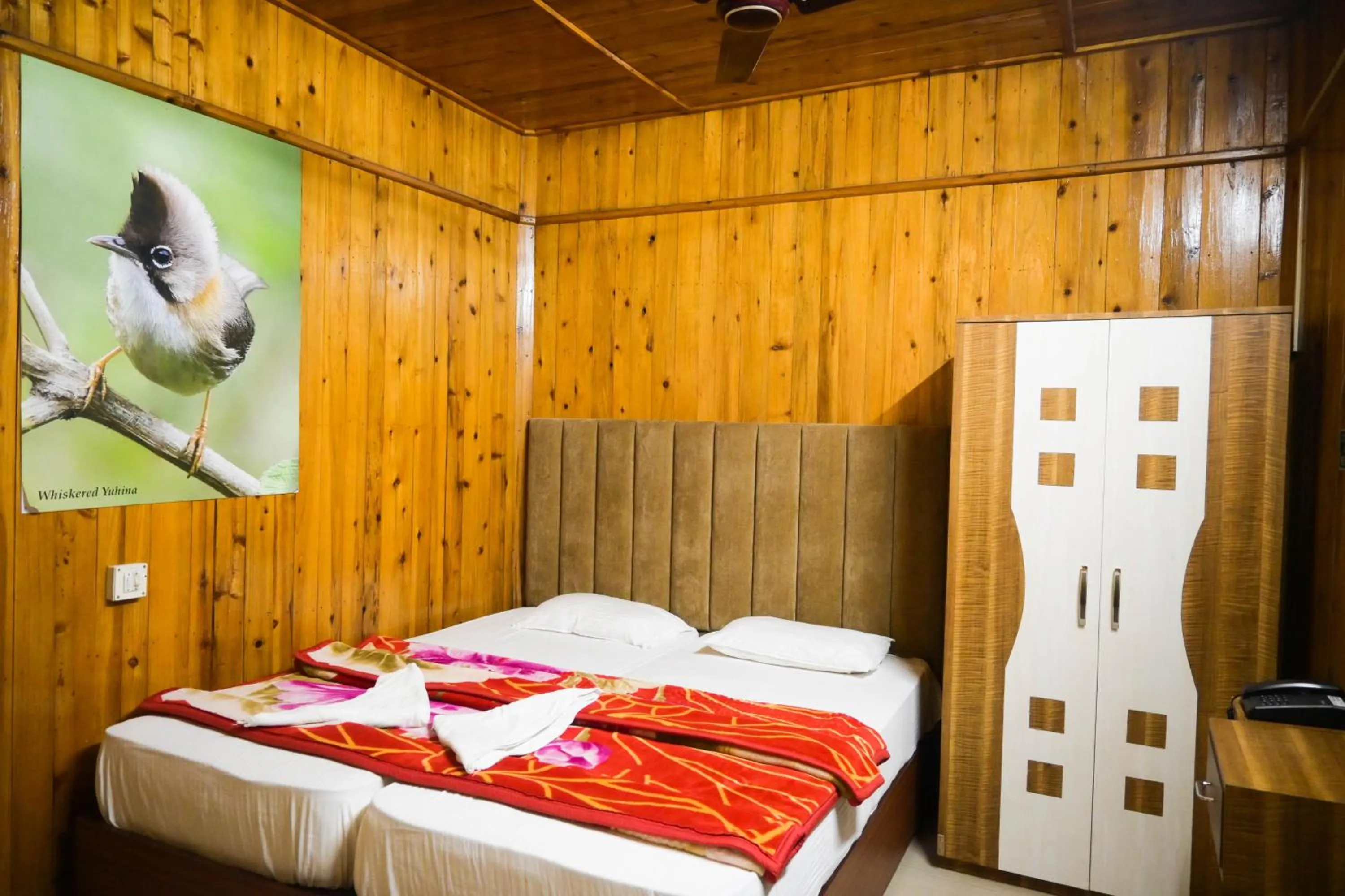 Property building, Bed in Aranya Jungle Resorts