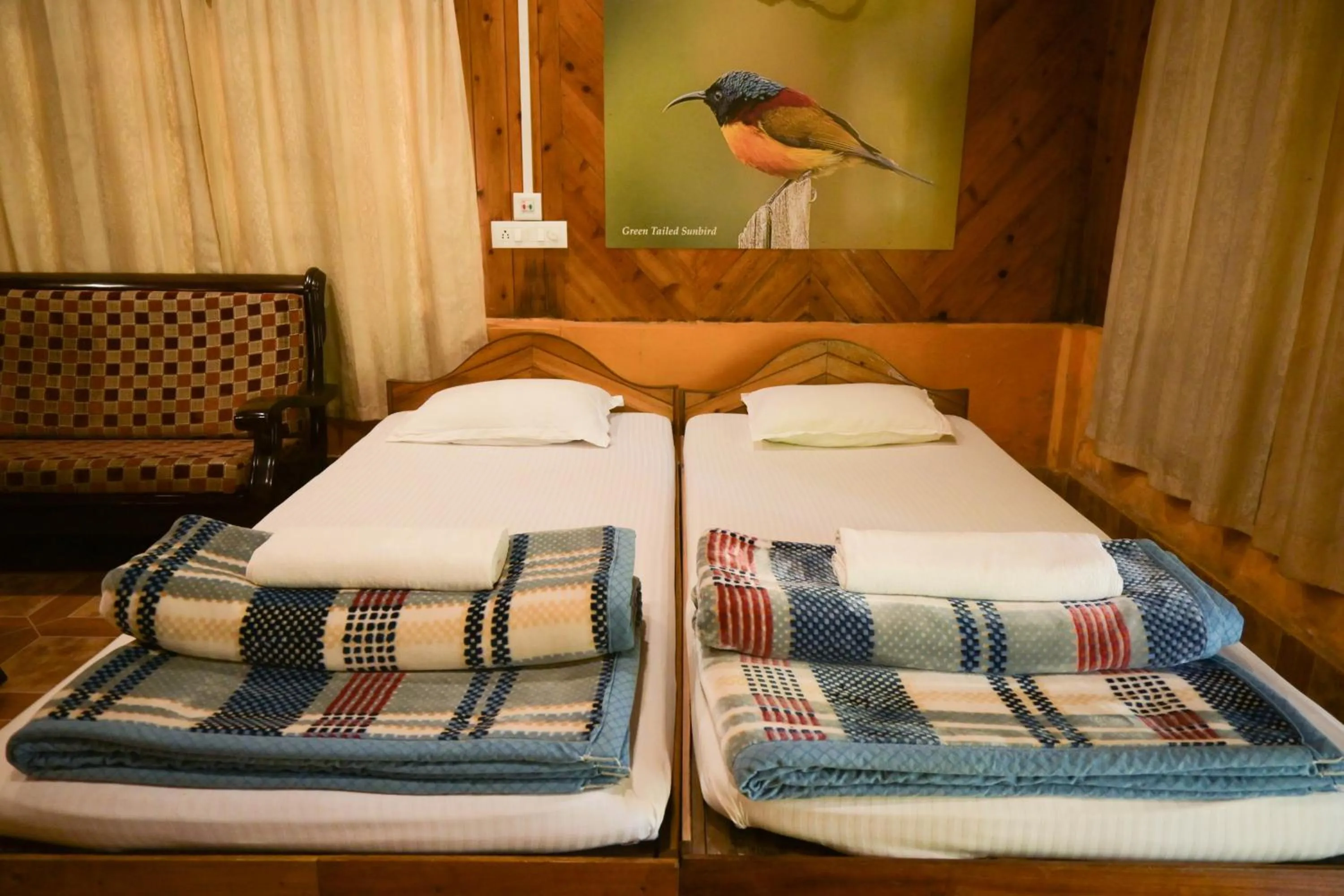 Bed in Aranya Jungle Resorts